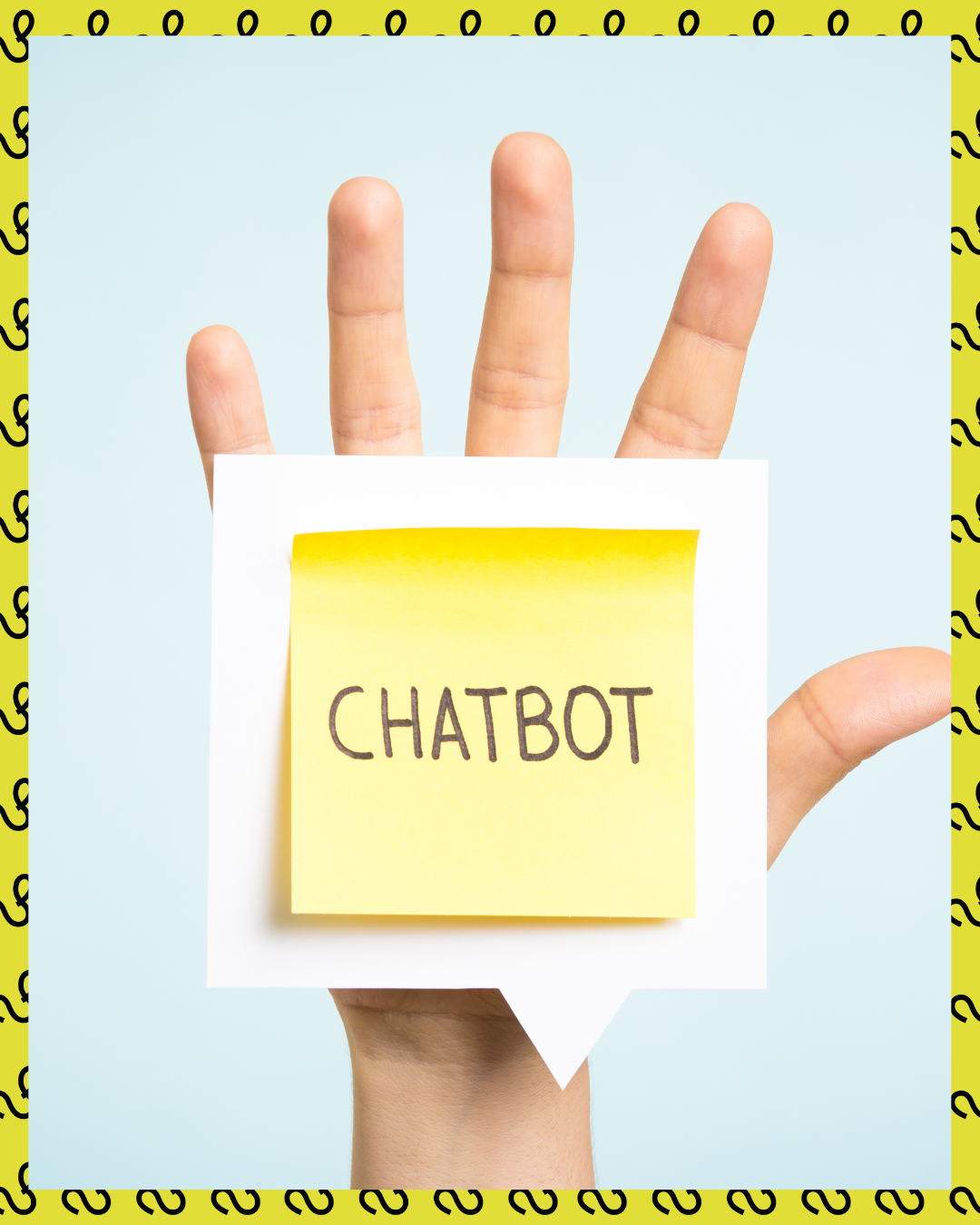 Hand holding a note that says chatbot, against a light blue background with question mark pattern border.